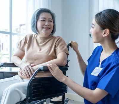 asian-nurse-take-care-senior-woman-on-wheelchair-at-nursing-home-care-.jpg