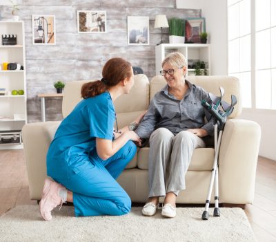 female-nurse-talking-with-an-old-woman.jpg